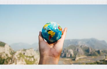 Hand holding Globe 2